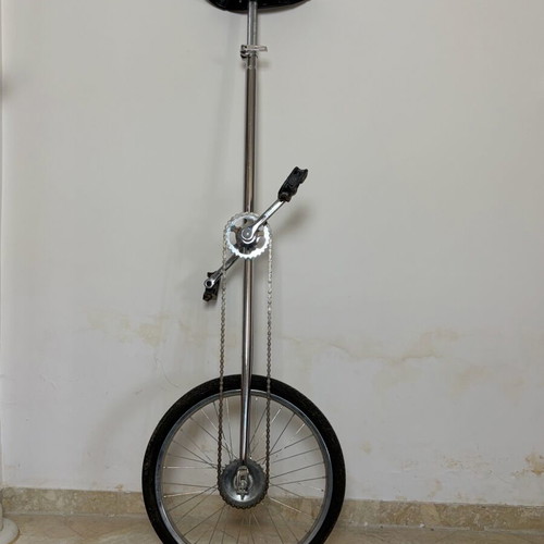 Unicycle used, 1.5 meter tall, silver