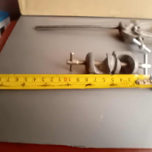 Old laboratory tools used for holding test tubes and bottles