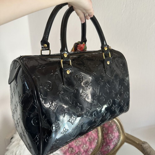 Louis Vuitton old black bag with gold accessories