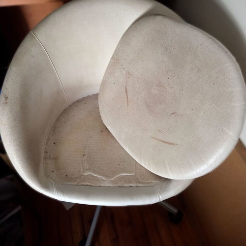 White office chair with adjustable height and swivel base