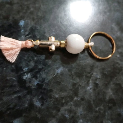 Handmade keychain, with a gold cross, Fuchsia tassel, white round wooden bead, new