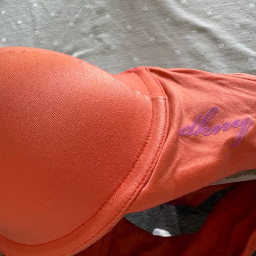 DKNY bra like new, sports style, coral with purple straps, 85C