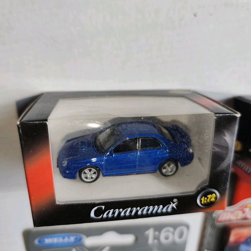 Set of 4 sport diecast cars new, various sizes