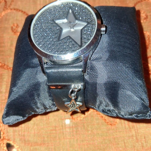 Thierry Mugler wristwatch with leather strap and silver star charm