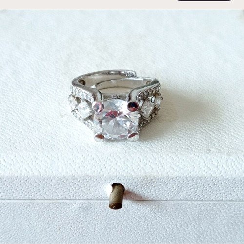 Galerie Tsangarakis rings with white sapphires like new, plated silver