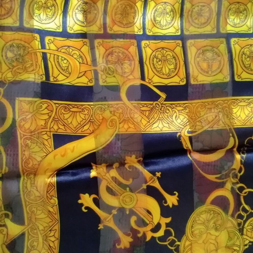 Women's semi-transparent scarf like new, blue with gold designs