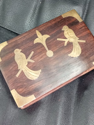 Wooden box with bronze doves used