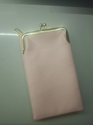 Pink wallet with strap and multiple compartments