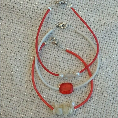 Set of 3 Martis bracelets new with rubber cords