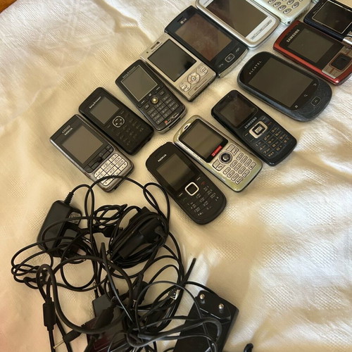 Various used cell phones, some working