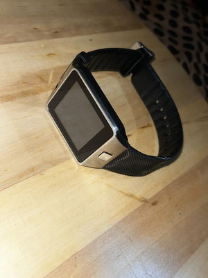 Smart watch used, battery not working, with camera and SIM card