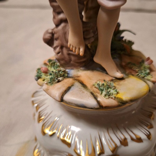 Capodimonte porcelain boy with flute like new with artist signature