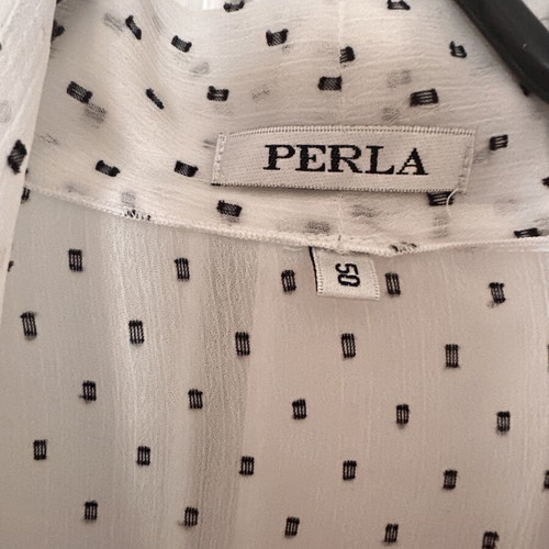 White wrap top with subtle polka dot pattern, like new
