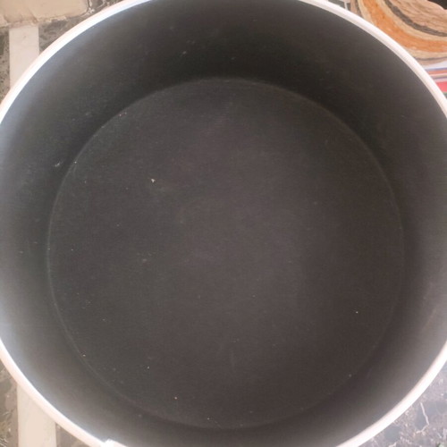 Side table used, round with storage