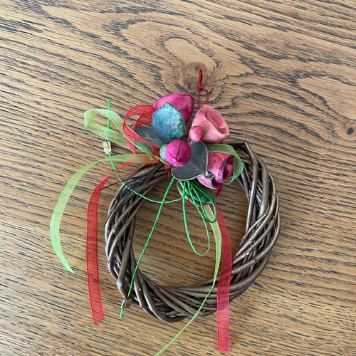 Handmade decorative wreath with ceramic flowers, like new