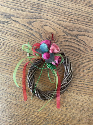 Handmade decorative wreath with ceramic flowers, like new