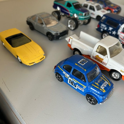Toy cars 1/43 and 1/32 used, metallic racing and Suzuki models