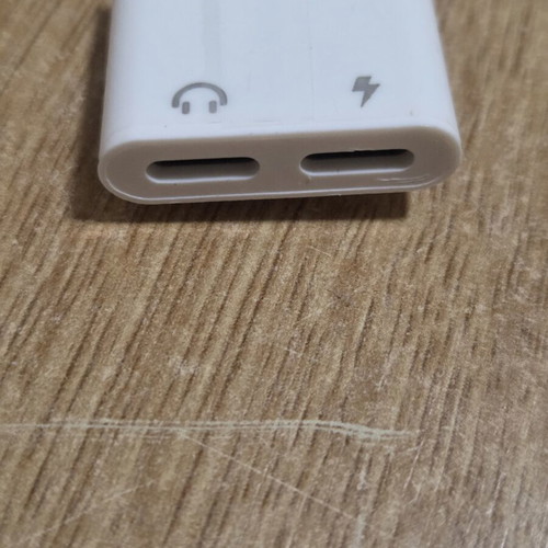 White 2-in-1 audio adapter with Lightning connector for iPhone, new