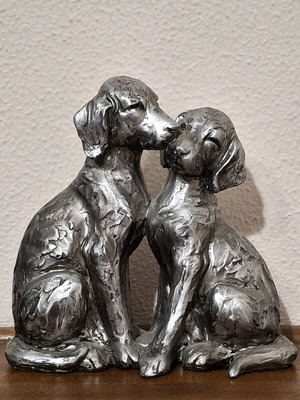 Decorative wooden figurine of loving dogs like new