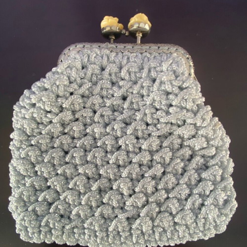 Handmade knitted wallet like new, medium size, silver with rose clip