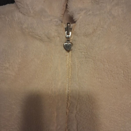 Reversible fur jacket with hood and pockets