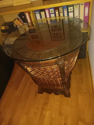 Bamboo table like new with storage space under glass