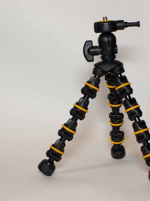 Mini tripod for cameras like new
