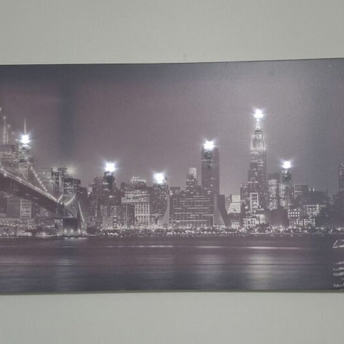 Fabric wall art with purple grey shades and LED lights