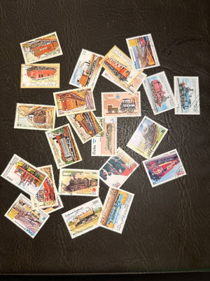 Vintage stamp collection with trains and steam engines theme
