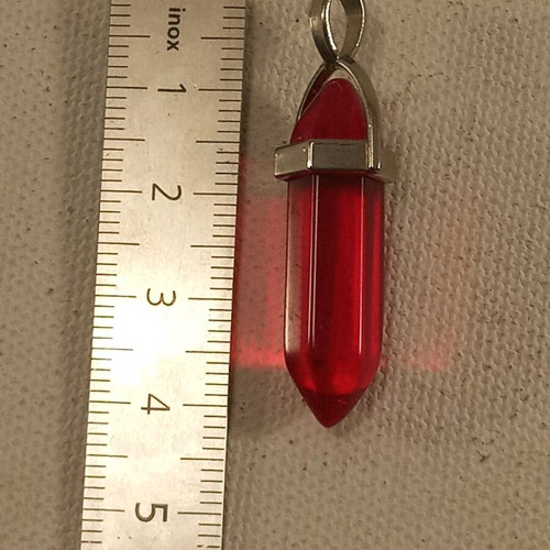 Metal pendant with red glass like new, 4.5 cm length