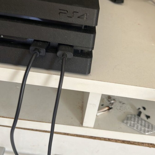 PlayStation 4 Pro like new with two controllers, 1TB storage