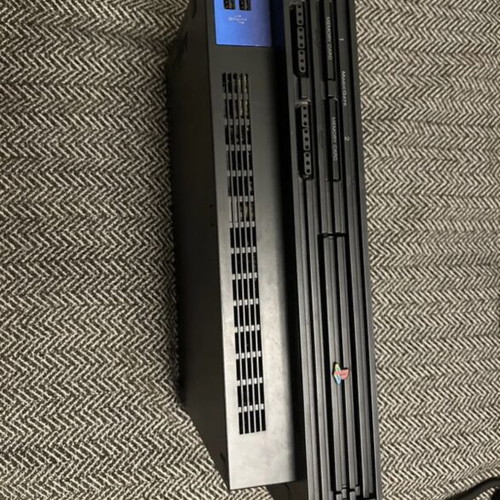 PlayStation 2 used with cables and functional