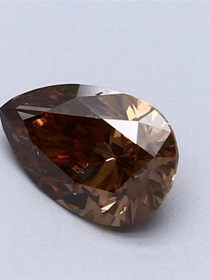 Natural color diamond 1.02 ct pear fancy deep brown orange SI1 IGI
