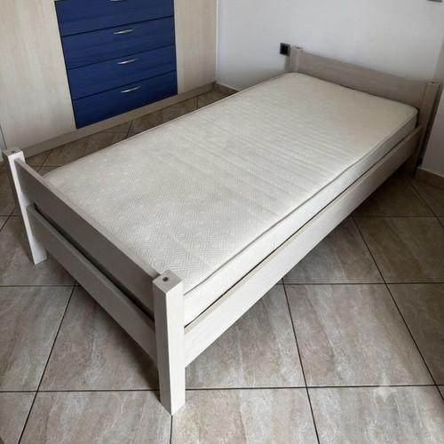 Single wooden children's bed with mattress used, moderate condition