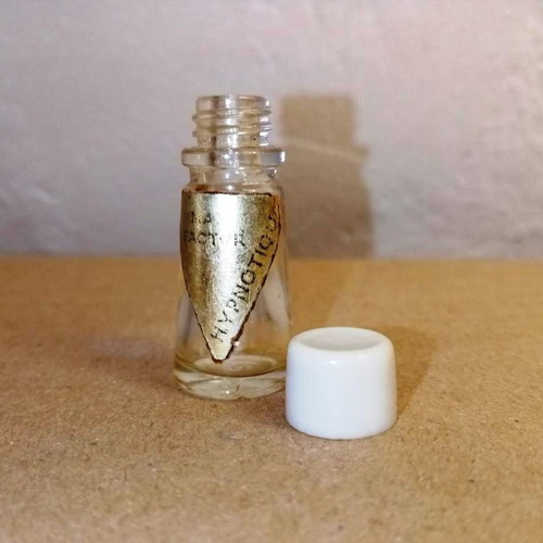 Hypnotique miniature bottle by Max Factor used, collectible