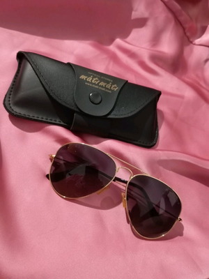 Luk women's sunglasses used, black and gold