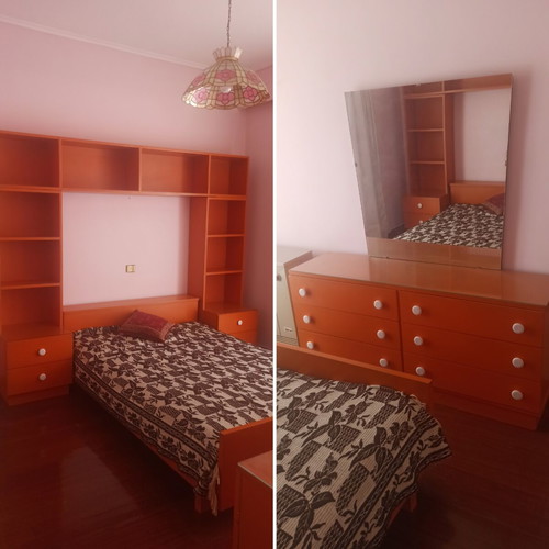 Wooden bedroom set with bed, mattress, nightstands, bookshelf, dresser with mirror