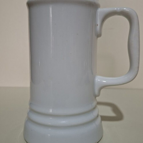 Large beer glass in traditional German design like new