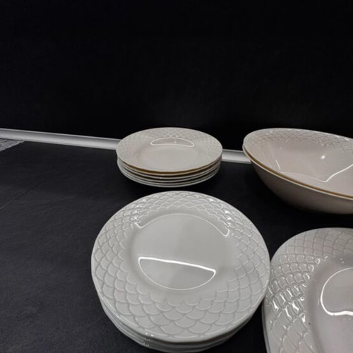 Porcelain dinnerware set with embossed design, like new