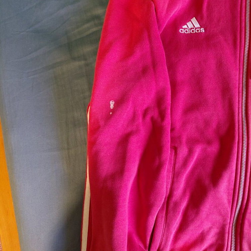 Manchester United jacket authentic used with small chlorine stain