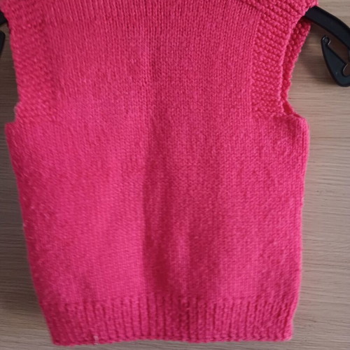 Children's knitted vest like new, pink, for ages 3-4