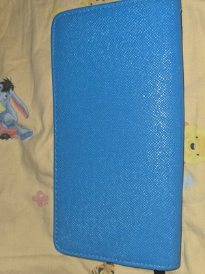 Wallet used, blue with orange details