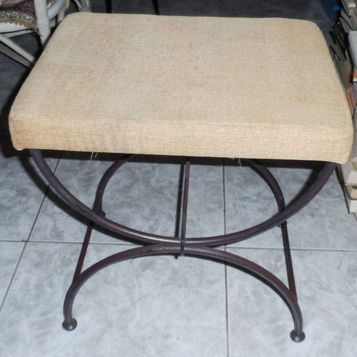 Vintage stool with iron base used, ancient Roman style