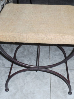 Vintage stool with iron base used, ancient Roman style