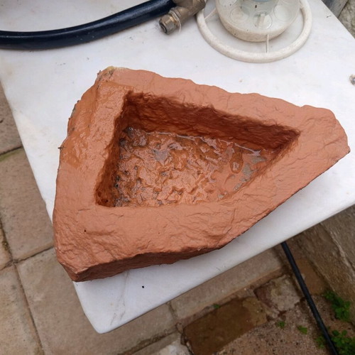 Stone waterer refurbished, carved stone