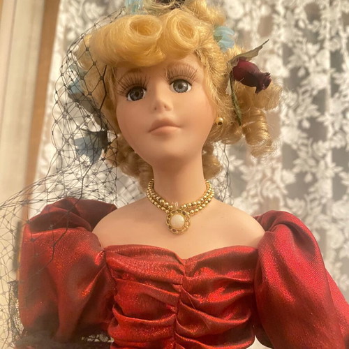 Porcelain doll like new