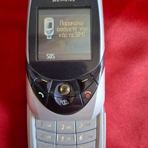 Siemens SL65 Ebony collectible cell phone used with packaging and accessories