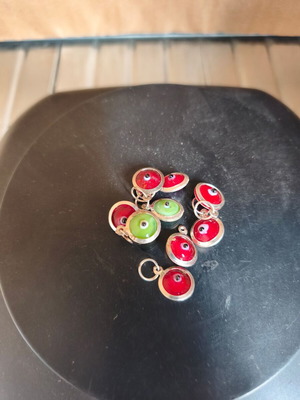 Glass eye charms used, pack of 9 pieces