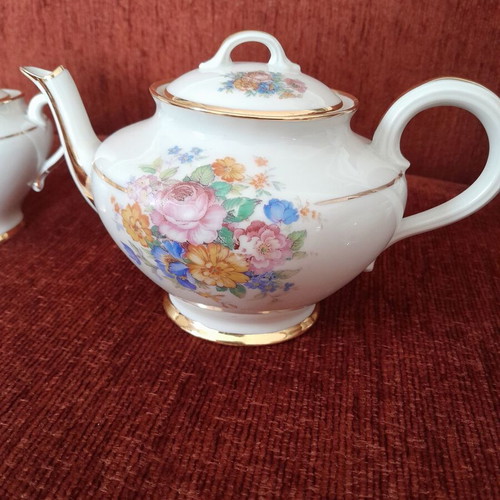Limoges tea set like new, vintage, missing one saucer
