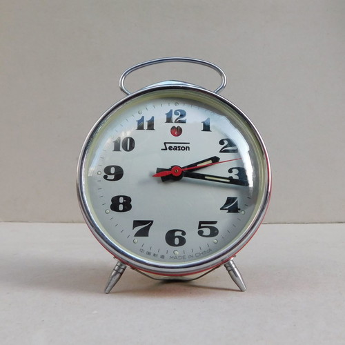 Metal wind-up vintage alarm clock